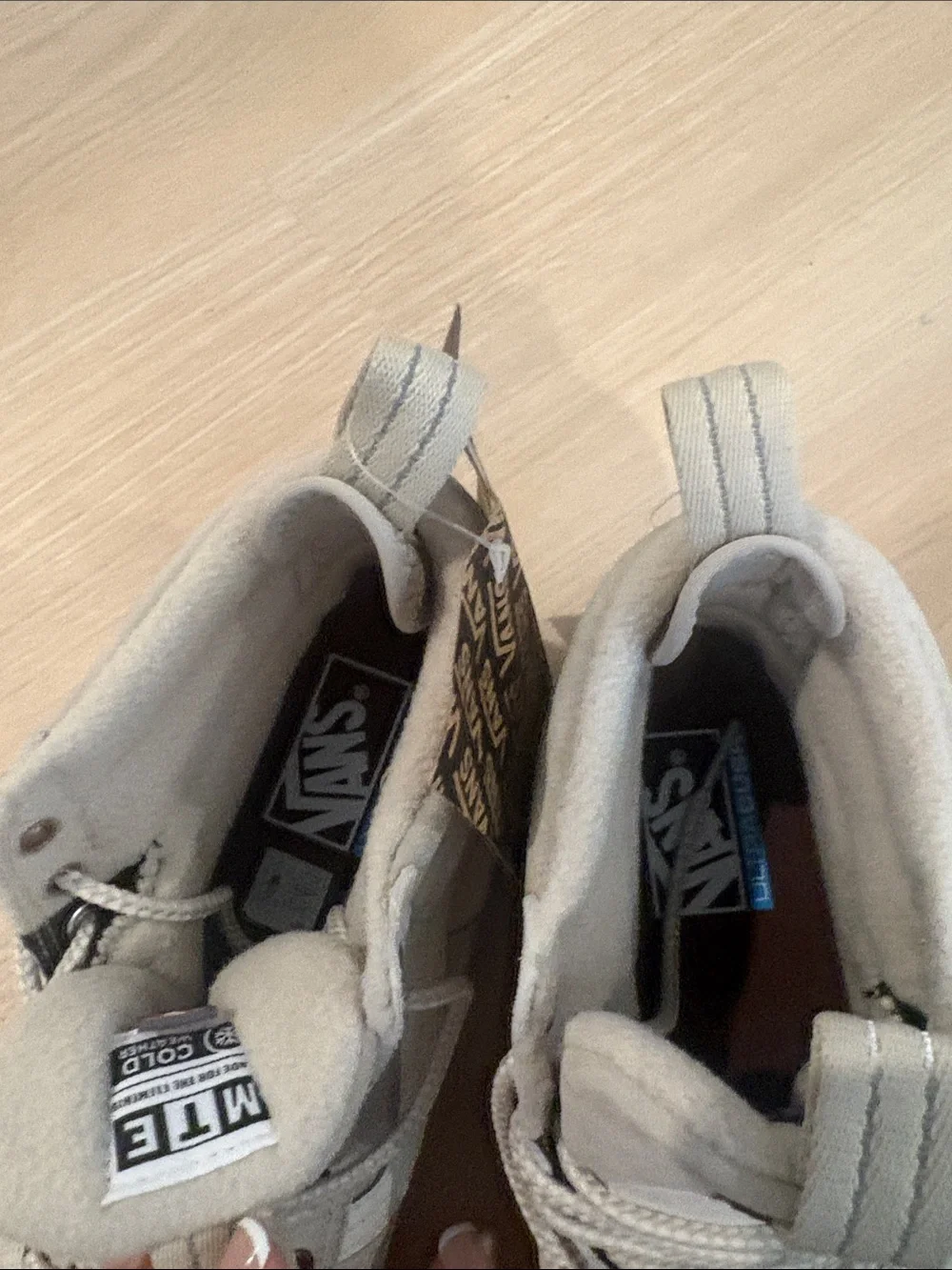 Vans women’s8.5/mens 7 High-Top Suede Sneakers in Light Gray and White
